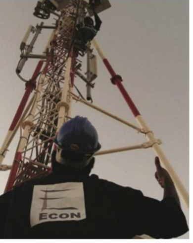 ECON rigger climbing a telecom tower